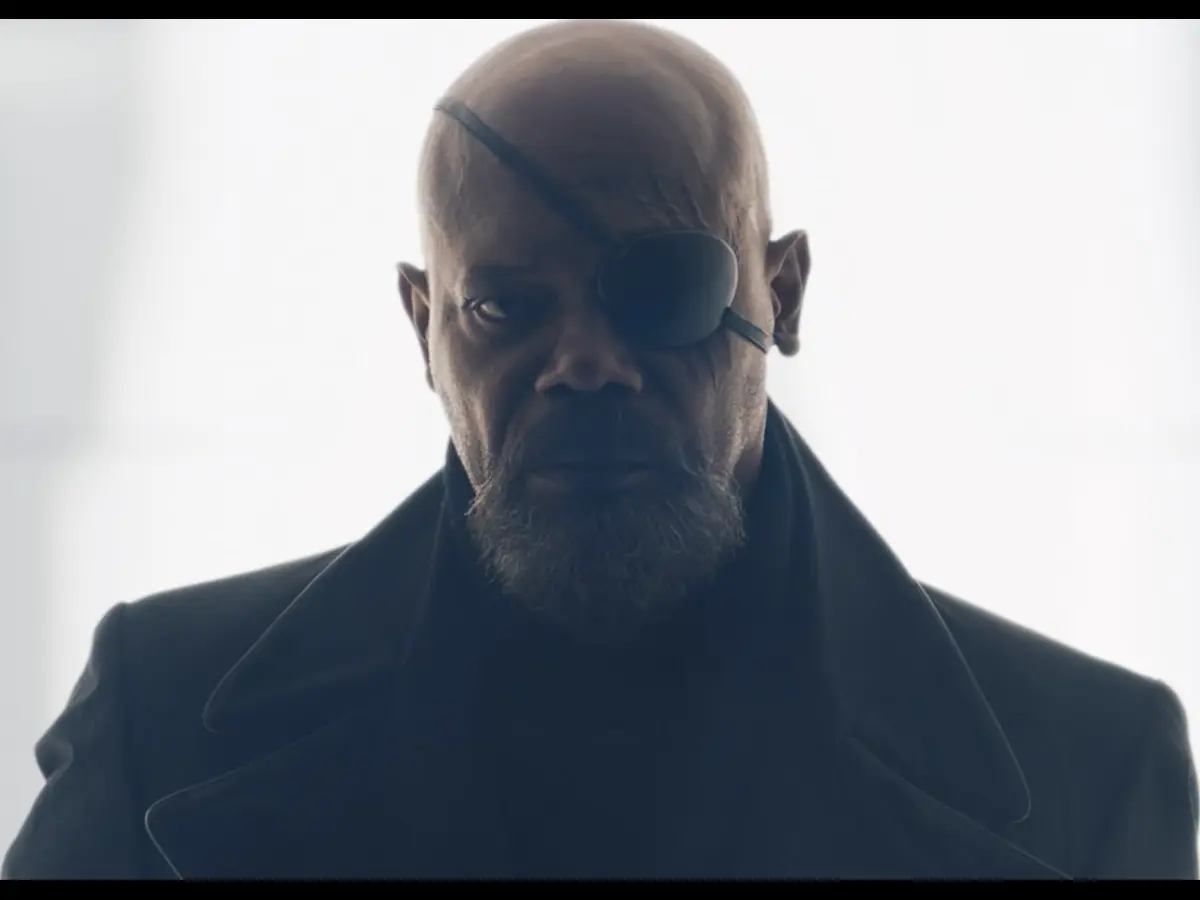 Closeup of Samuel L. Jackson as Nick Fury, wearing a black jacket and eye patch in "Secret Invasion" (2023).