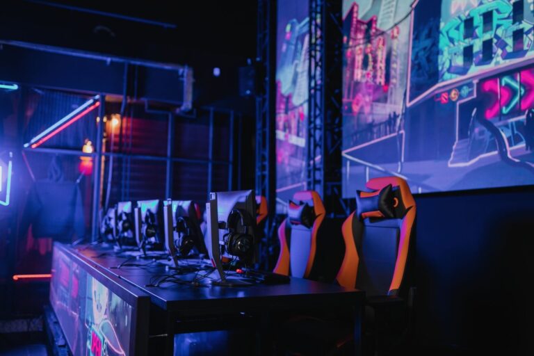 Empty esports gaming stations, illustrating the Kofyr RLCS ban from Rocket League competition
