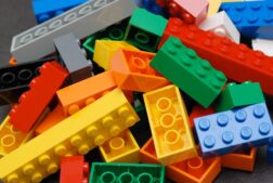 A pile of colorful LEGO bricks, the building blocks behind the LEGO Pokémon line