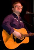 Mike Smith in character as Bubbles in April 2009; the Mike Smith sexual assault case was dismissed in 2026
