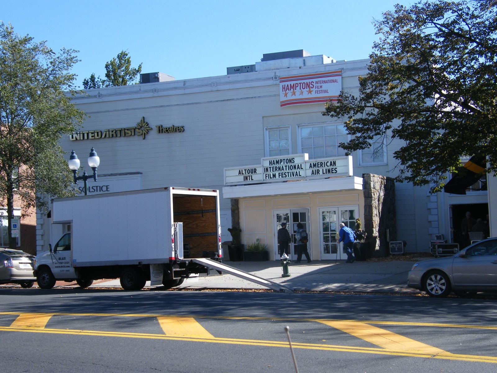 A theater marquee in East Hampton, New York, during the Hamptons International Film Festival, where Nina Gold receives a casting award