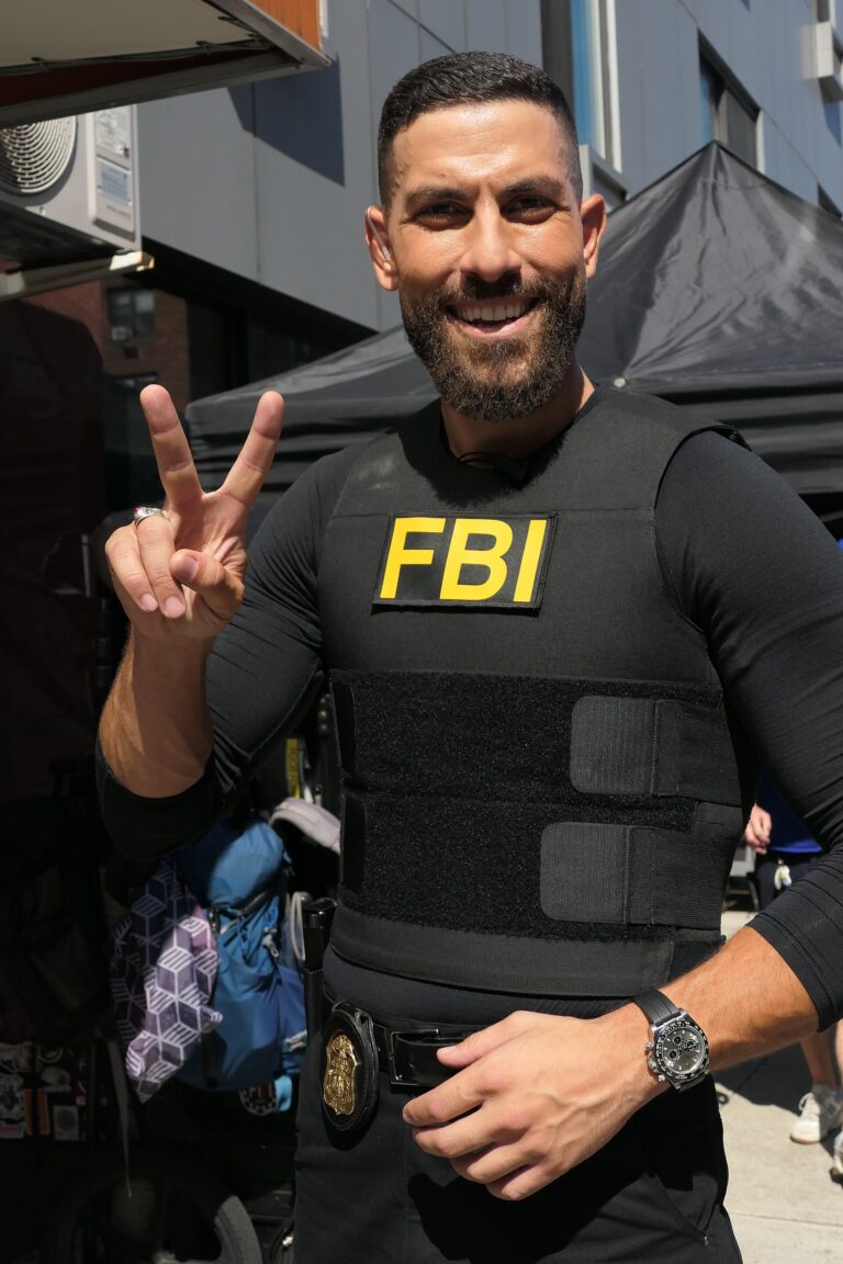 Zeeko Zaki wearing an FBI vest in an archival photograph, pictured for the FBI season 9 report
