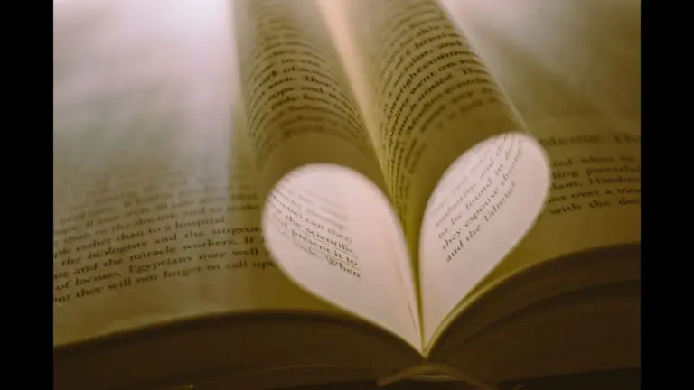 In Wednesday's daily devotional, an open Bible is shown with center pages shaped into a heart.
