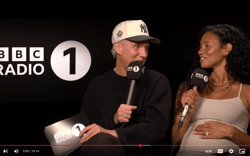 Vick Hope, wife of Calvin Harris showing baby bump during BBC Radio 1 interview.