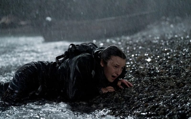 The Last of Us Season 2 Finale, Bella Ramsey as Ellie crawling up the Seraphite beach